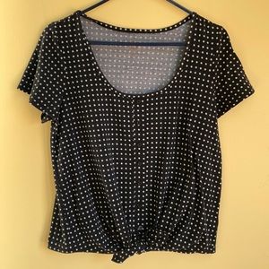 Black white polka dot shirt.